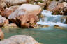 Tim hidden inside a rock at Havasu creek