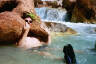 Conor hidden inside a rock at Havasu creek