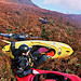 photo of boat on roof of car